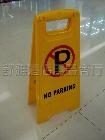 Signs (in English) sign warning caution slippery parking will be prohibited on