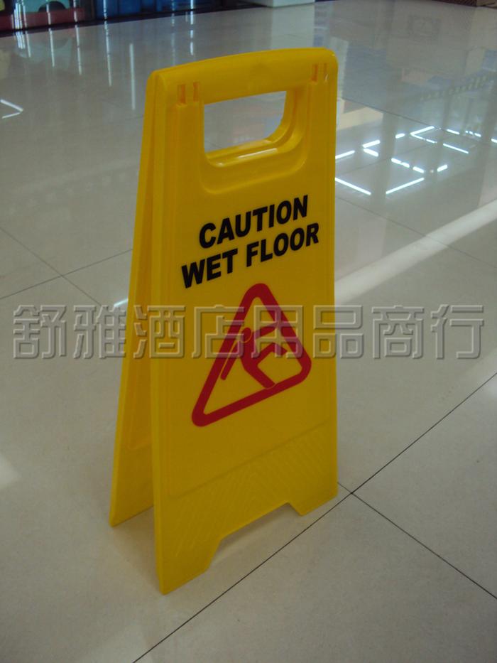Signs (in English) sign warning caution slippery parking will be prohibited on