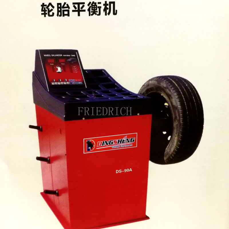 Small car with protective cover wheel tire balancing machine.