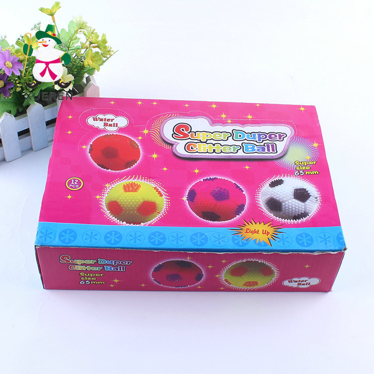 Children's toys to spread the hot flash football gadgets whistle 6.5cm luminous toy elastic massage ball