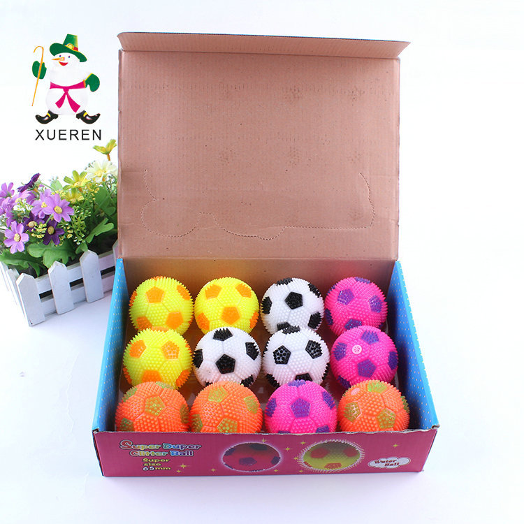Children's toys to spread the hot flash football gadgets whistle 6.5cm luminous toy elastic massage ball