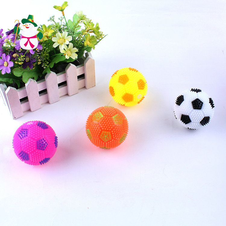 Children's toys to spread the hot flash football gadgets whistle 6.5cm luminous toy elastic massage ball