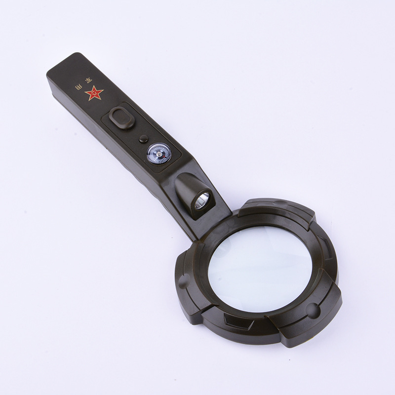 The TH600557 military green multi-function belt compass with a magnifying glass.