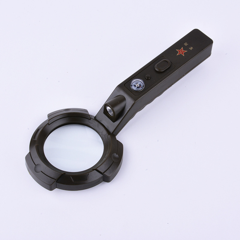 The TH600557 military green multi-function belt compass with a magnifying glass.
