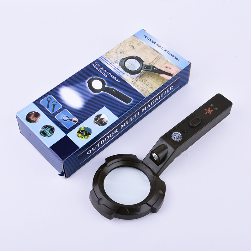 The TH600557 military green multi-function belt compass with a magnifying glass.