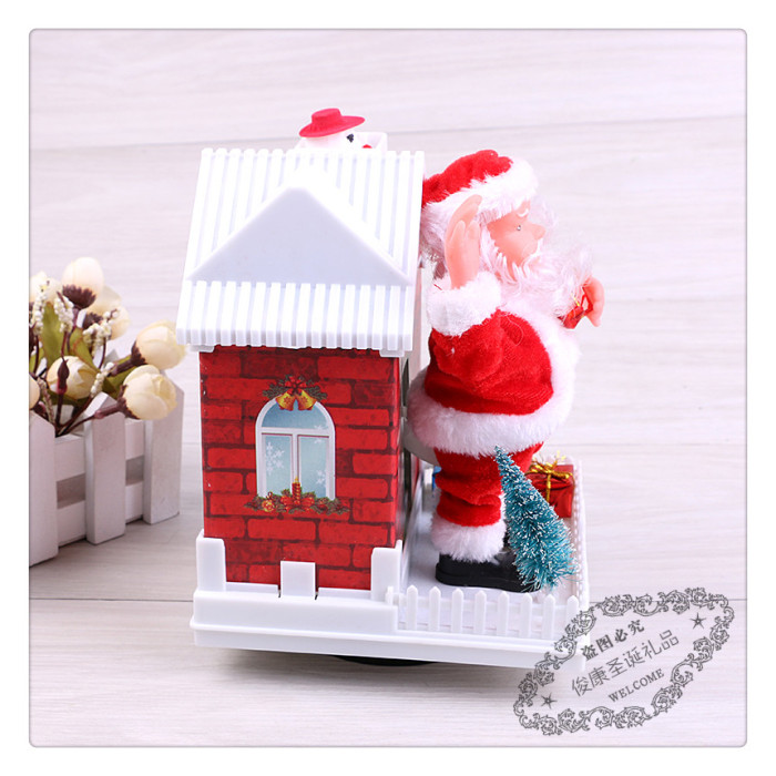 Christmas snow house electric music Santa Claus scene decorating the decorative tabletop presents Christmas snow house electric music Santa Claus scene decorating the decorative tabletop presents