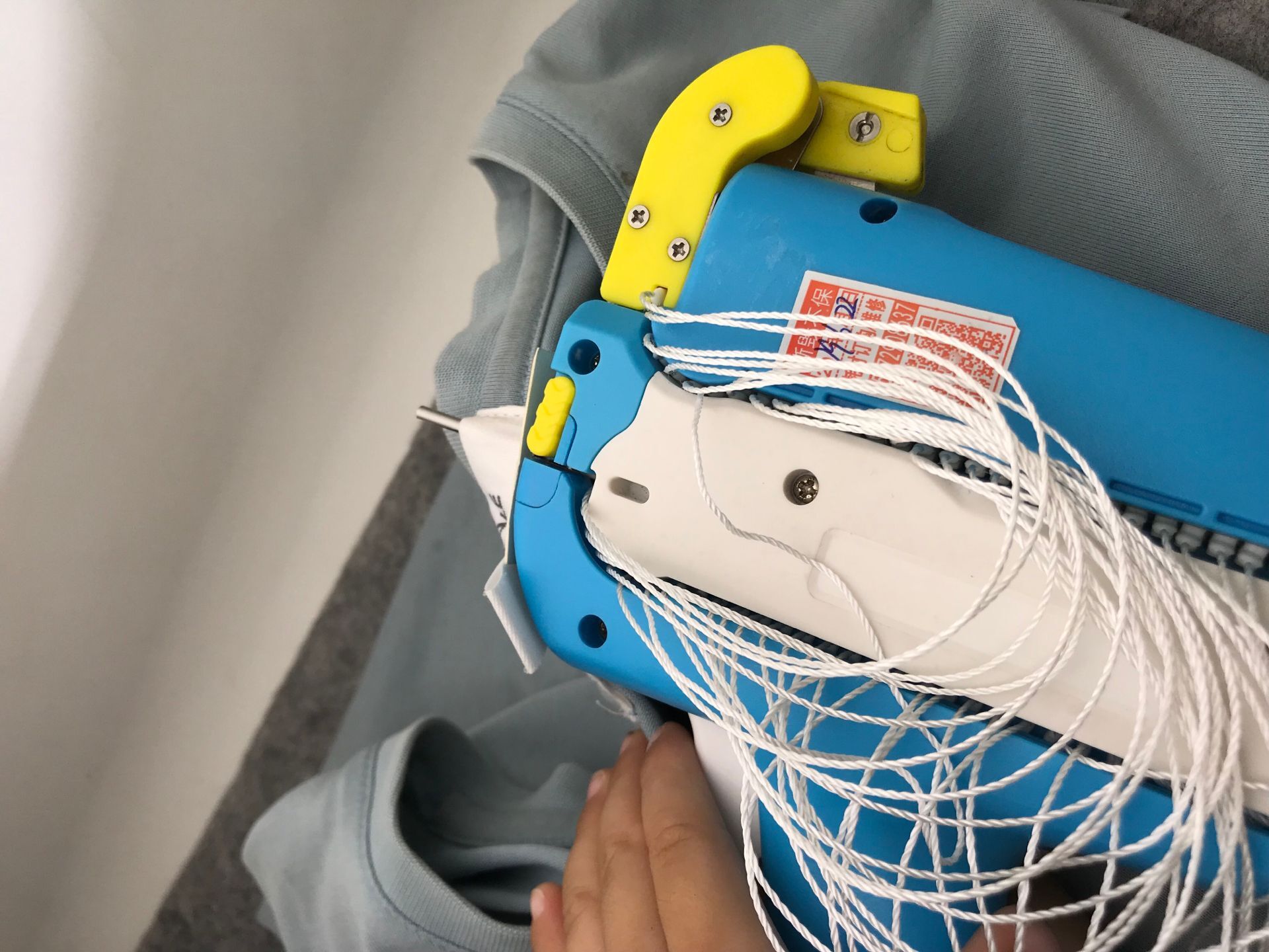 Spot polyester wrap-around hand wearing cordage mother button garment trademark hanging tag ring gun cartridge manufacturers direct sales