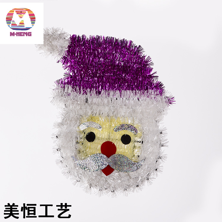 Santa Claus decorated the door with colorful woollen strips at Christmas Santa Claus decorated the door with colorful woollen strips at Christmas