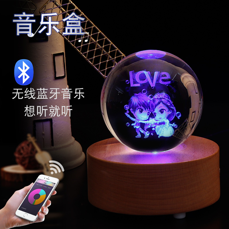 Manufacturers wholesale crystal ball bluetooth lamp holder rotating music box of clover crystal crafts