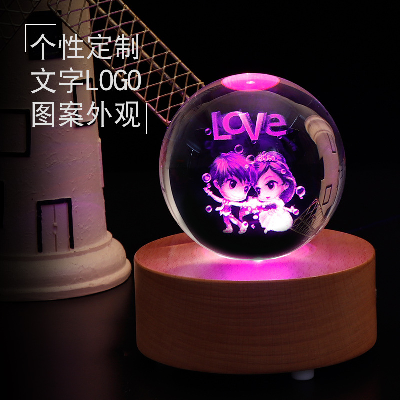 Manufacturers wholesale crystal ball bluetooth lamp holder rotating music box of clover crystal crafts