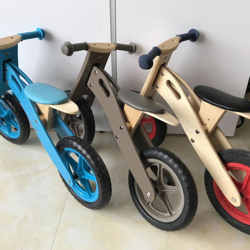 Export German wooden children's body sense balance car wooden sliding balance pedal-car children's educational toy car. Export German wooden children's body sense balance car wooden sliding balance pedal-car children's educational toy car.