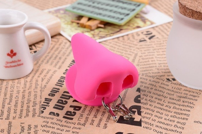 Creative silicone Keychain new mobile phone nose suction cup bracket