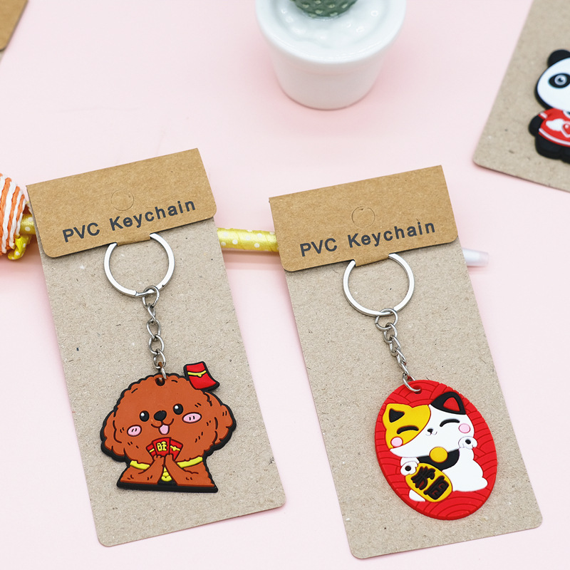 Factory Direct Supply Paper Card PVC Flexible Glue Keychain Cartoon Car Key Pendant Push Gift Wholesale plus Logo