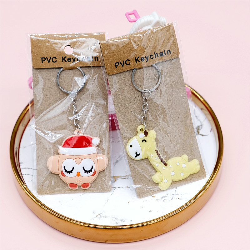 Factory Direct Supply Paper Card PVC Flexible Glue Keychain Cartoon Car Key Pendant Push Gift Wholesale plus Logo