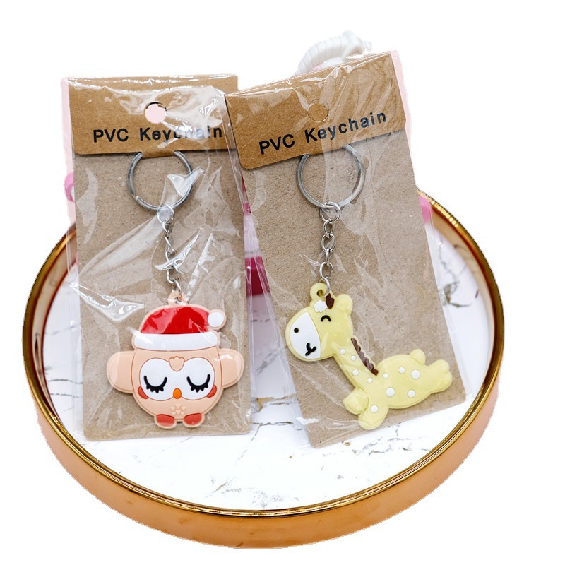 Factory Direct Supply Paper Card PVC Flexible Glue Keychain Cartoon Car Key Pendant Push Gift Wholesale plus Logo
