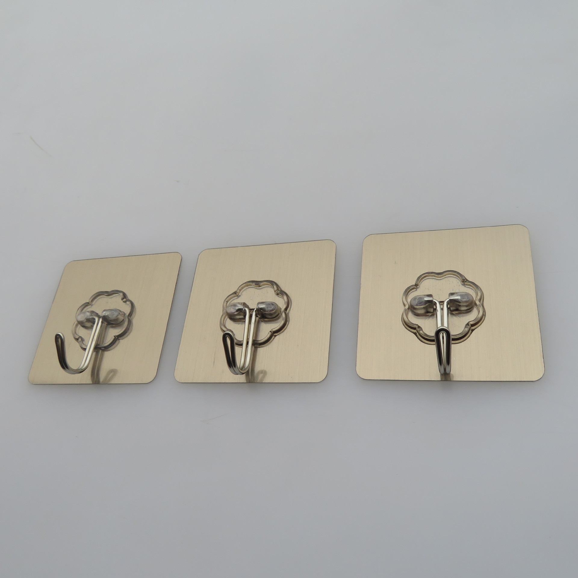 The Six centimeters brushed silver hook small hook strong adhesive hook taobao express magic stick hook factory