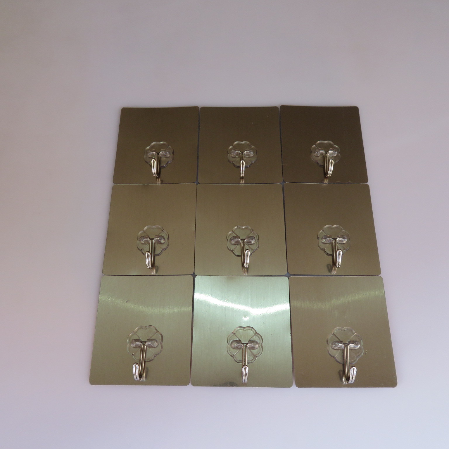 The Six centimeters brushed silver hook small hook strong adhesive hook taobao express magic stick hook factory